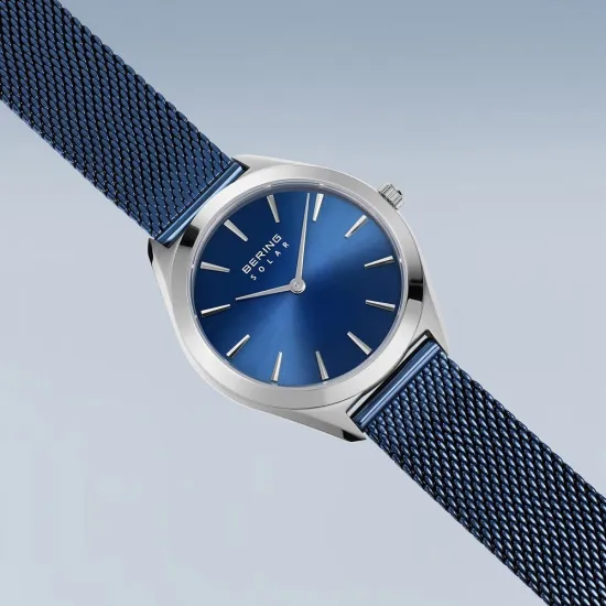 BERING Damenuhr Solar silberfarben mit Milanaiseband blau 17331-307