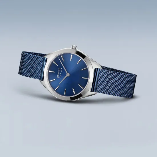 BERING Damenuhr Solar silberfarben mit Milanaiseband blau 17331-307